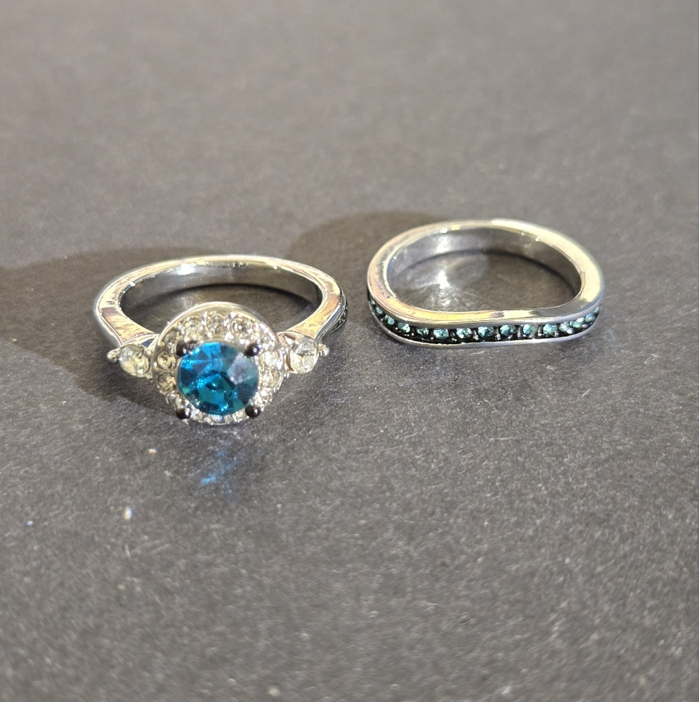 Engagement set size 6 simulated blue topaz with simulated diamond accents..25036